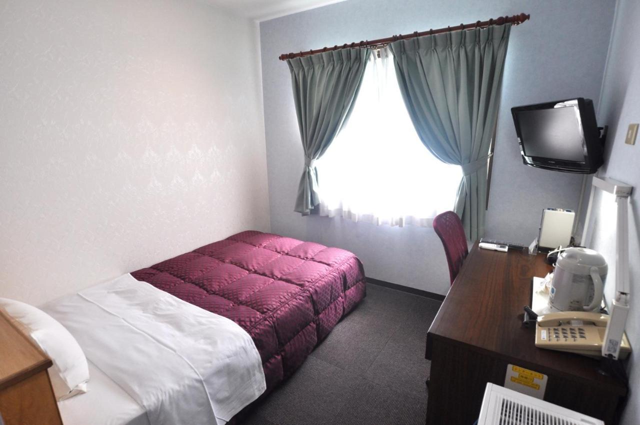 Futsukaichi Green Hotel Chikushino Bagian luar foto