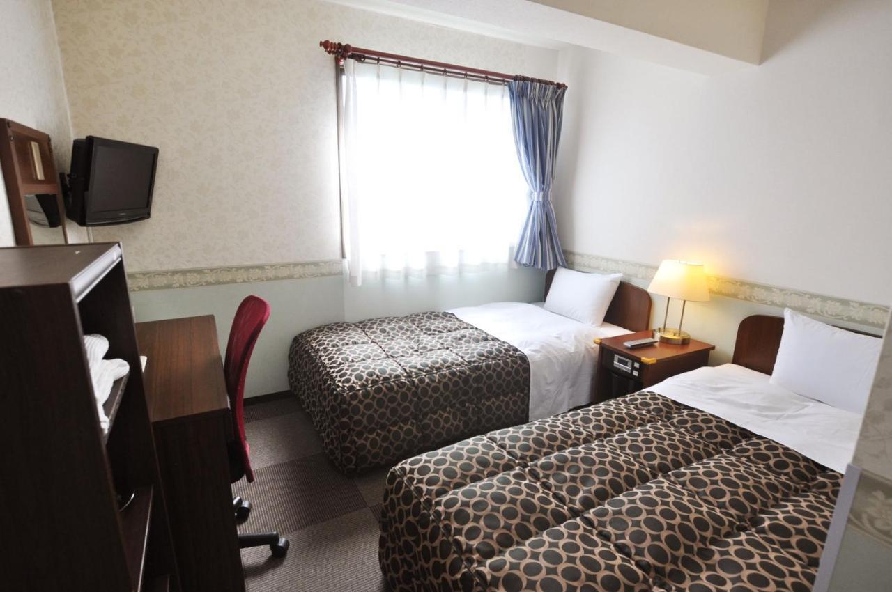 Futsukaichi Green Hotel Chikushino Bagian luar foto