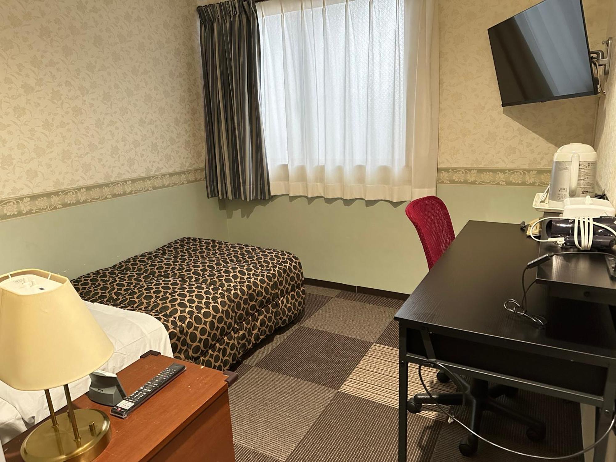 Futsukaichi Green Hotel Chikushino Bagian luar foto